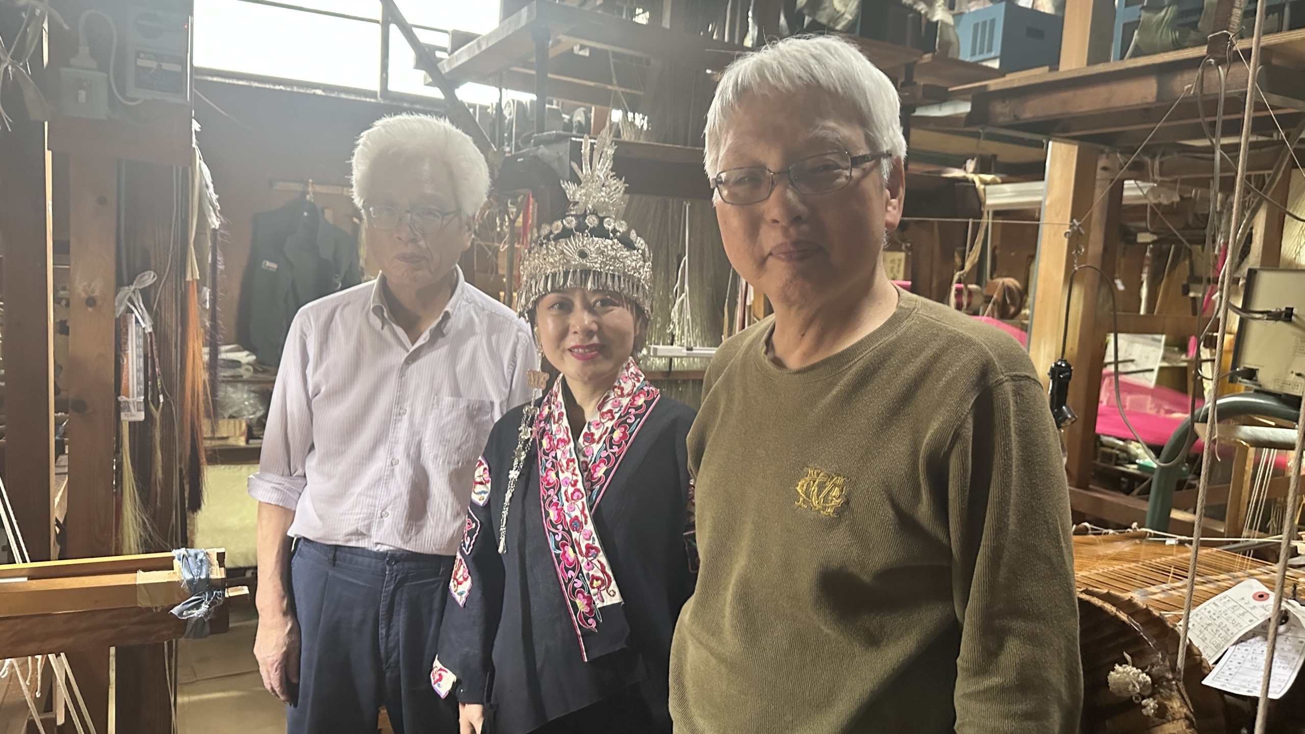 Ms. 蒋紅麟, Miao Intangible Cultural Heritage Paper Cutting Artist, and our hand-weaving artisans